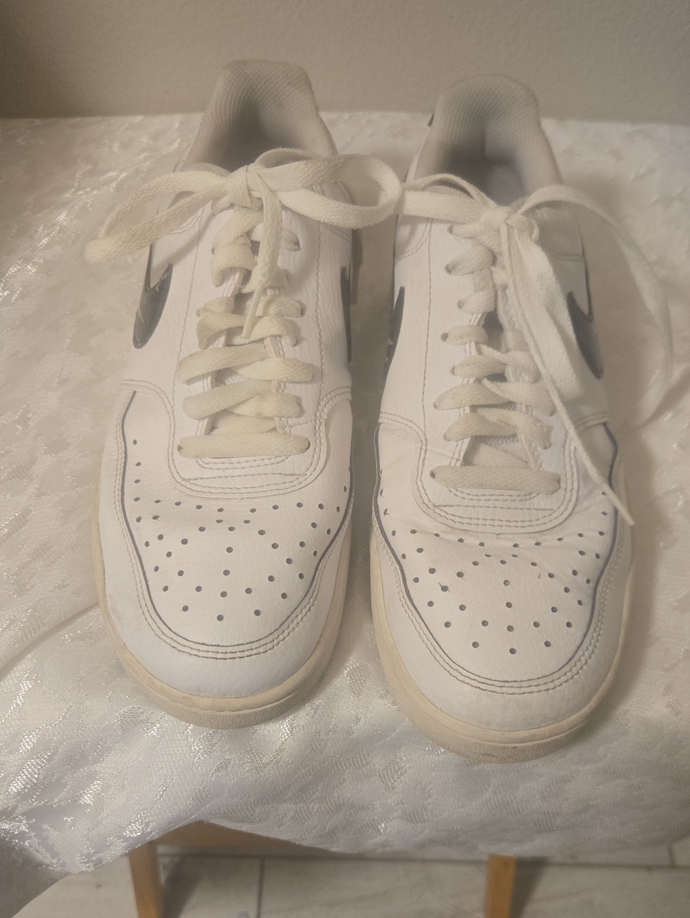 Nike White Low-Top Sneakers with Black Swoosh